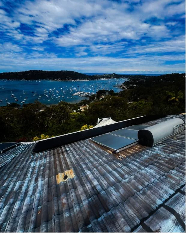 Rooftop solar hot water system overlooking the bay