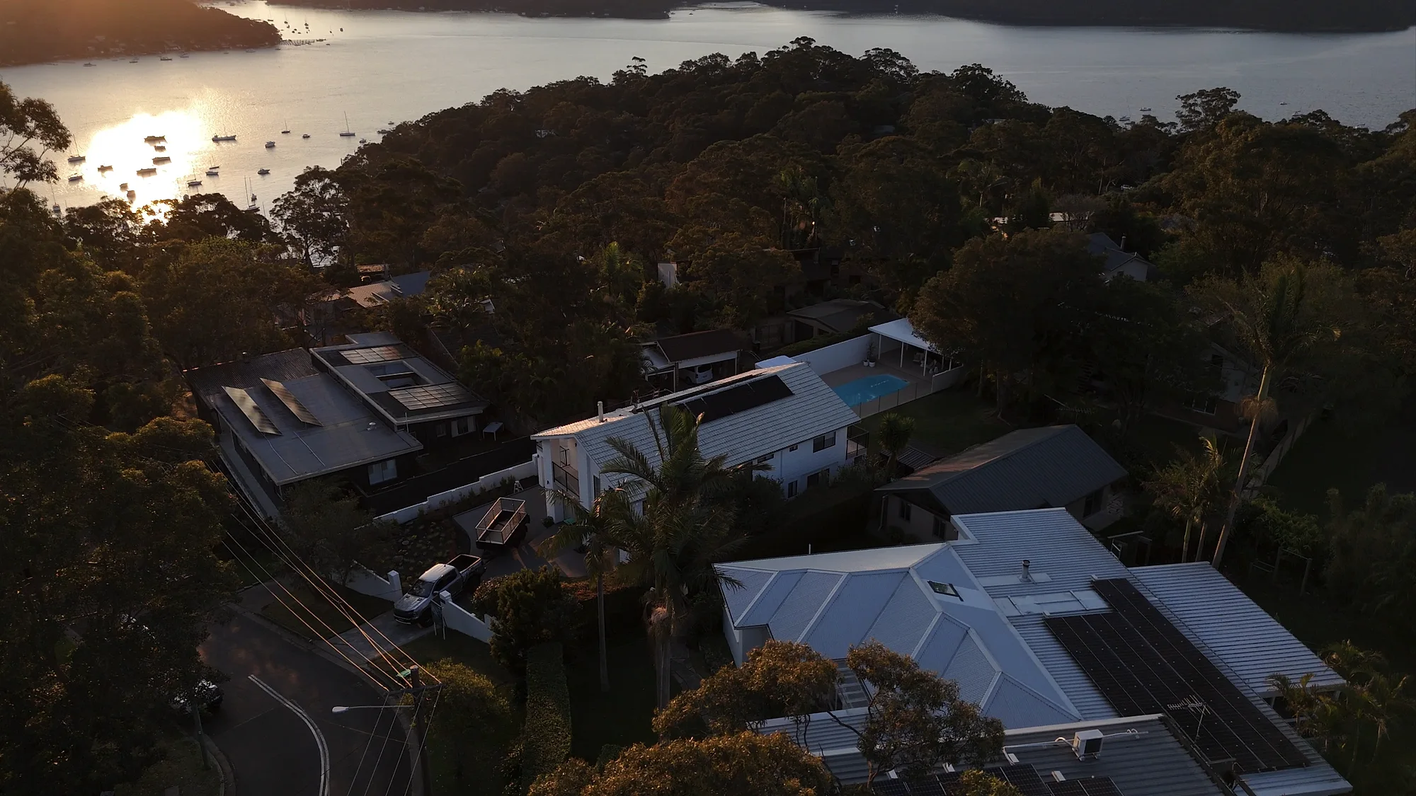 Drone view over Panda Power solar installations at sunset
