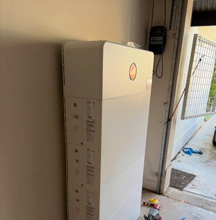 Home battery installed at the garage entry